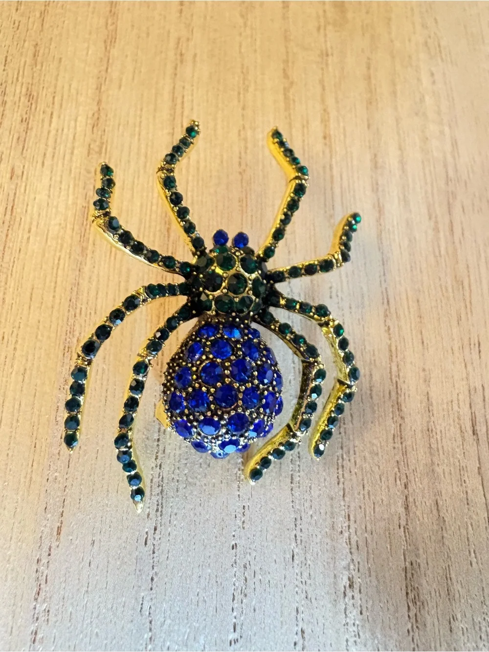 Gold-tone Spider Brooch with Blue and Green Rhinestones